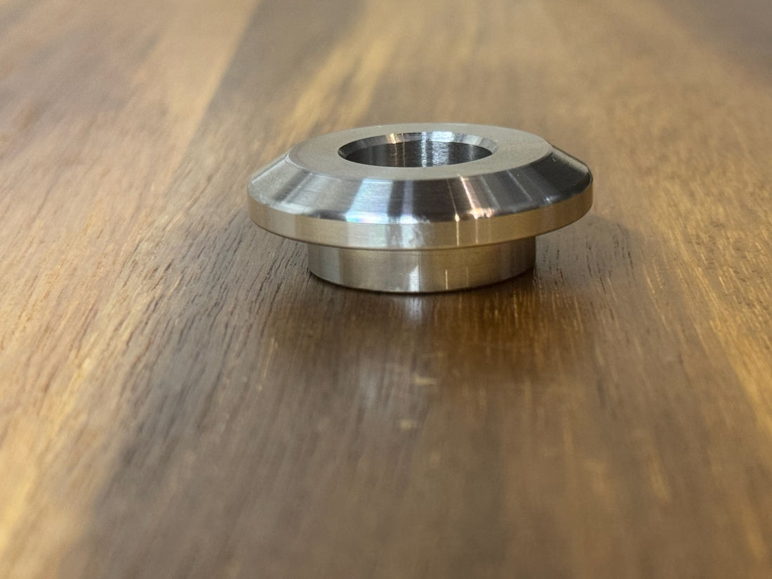 EXTSW  .634” ID x 1.490" OD x 1/2” thick -Stepped 1/4 x 1" - Beveled 316 Stainless Washers