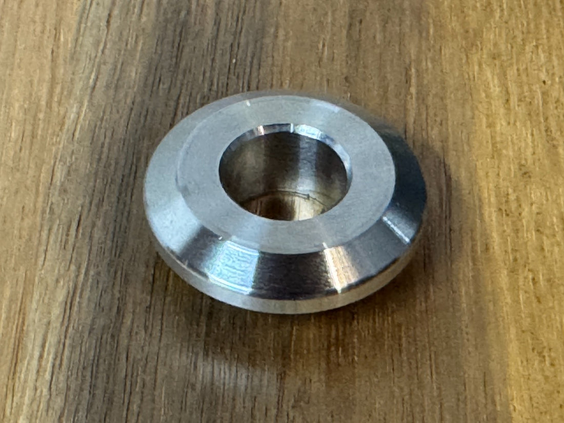 EXTSW  .634” ID x 1.490" OD x 1/2” thick -Stepped 1/4 x 1" - Beveled 316 Stainless Washers