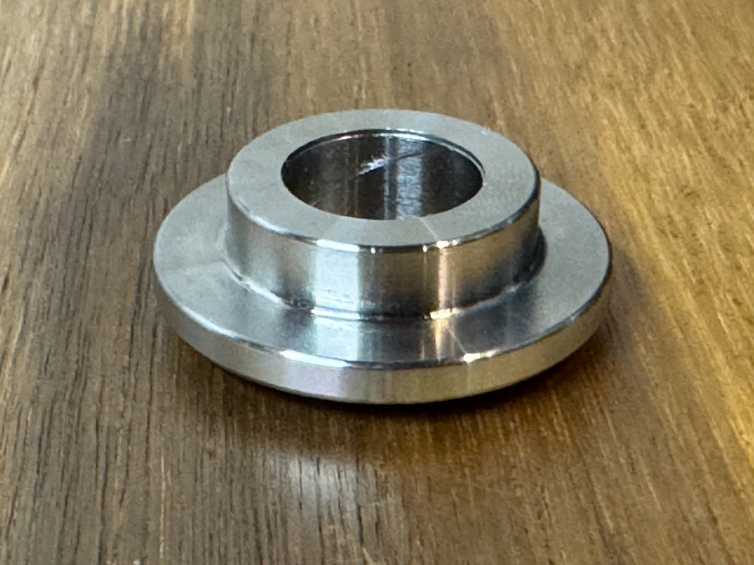 EXTSW  .634” ID x 1.490" OD x 1/2” thick -Stepped 1/4 x 1" - Beveled 316 Stainless Washers