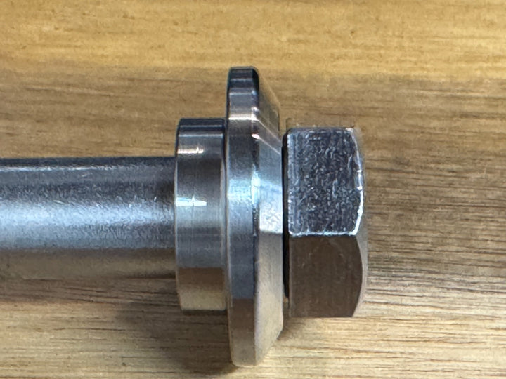 EXTSW  .634” ID x 1.490" OD x 1/2” thick -Stepped 1/4 x 1" - Beveled 316 Stainless Washers